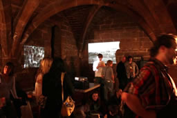 The inside of The Crypt, with slide show installations <em>Machines</em> by Cormac Faulkner (l) and Ring Road by Emilie Gould (r)